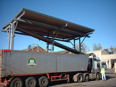 Twin bay lorry sheeting gantry with roof